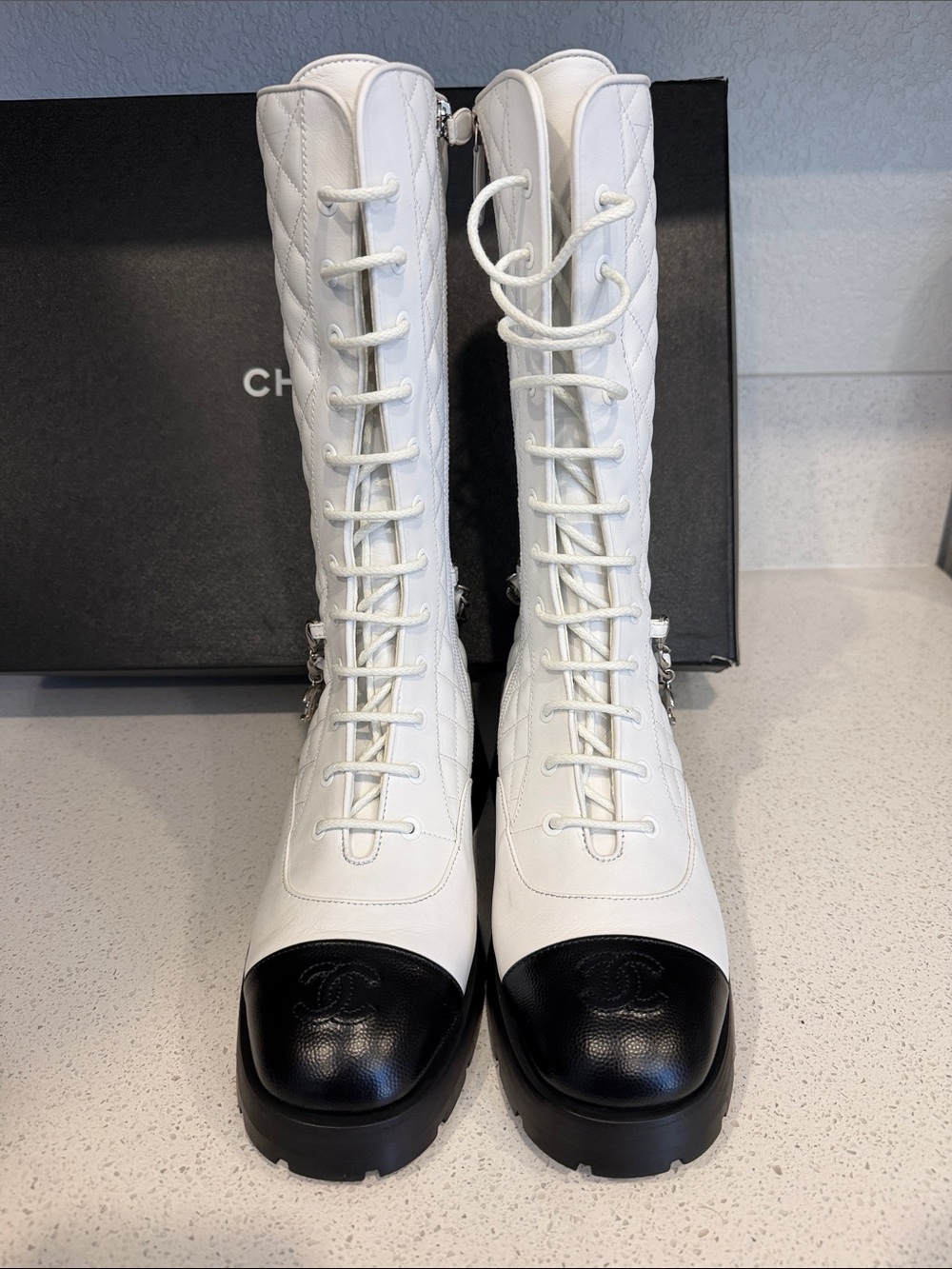 CHANEL White Quilted Leather Lace-Up Combat Boots with Black Cap Toe & Chain - Picture 2 of 6